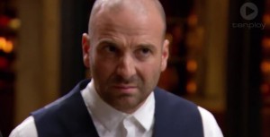 George is not happy about the lamb dish - and the fact his shirt is buttoned to the top without a tie because they are trying to make him look hip.